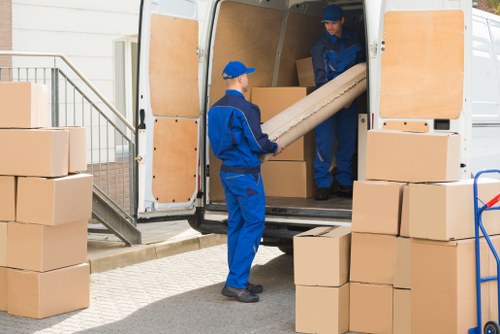 Moving van and packed boxes for Chelsea removals
