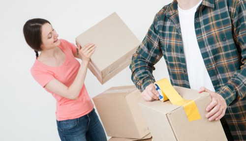 Loading boxes and furniture for a Chelsea relocation with volume-based estimates