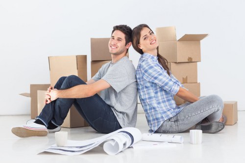 Chelsea movers supporting a business relocation with boxes and office furniture