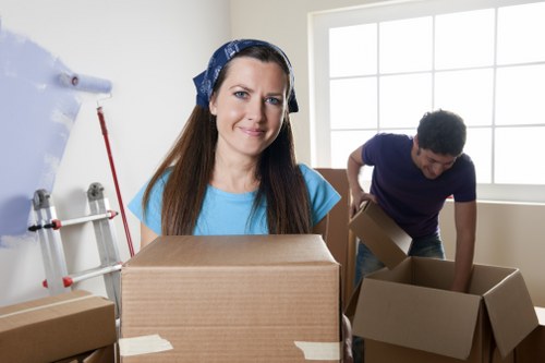 Packed furniture and boxes ready for a Chelsea house move
