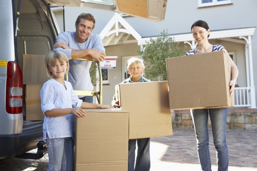Loading boxes and furniture into a hire truck for a Chelsea move