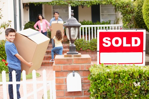 Professional packers organising boxes for a Chelsea residential relocation