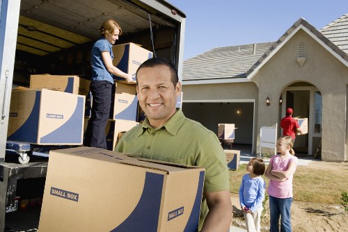 Packed boxes and furniture prepared for a Chelsea removals job